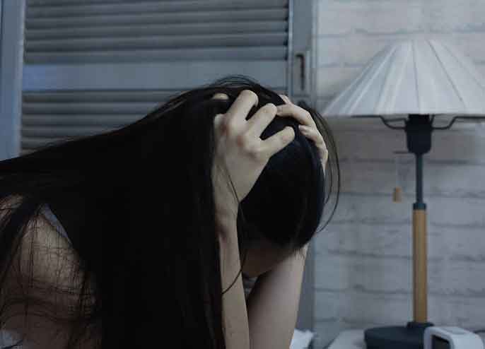 夜中に頭痛で目が覚める原因